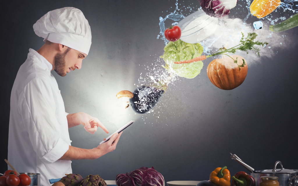 A chef using an AI recipe maker to elevate his cooking.